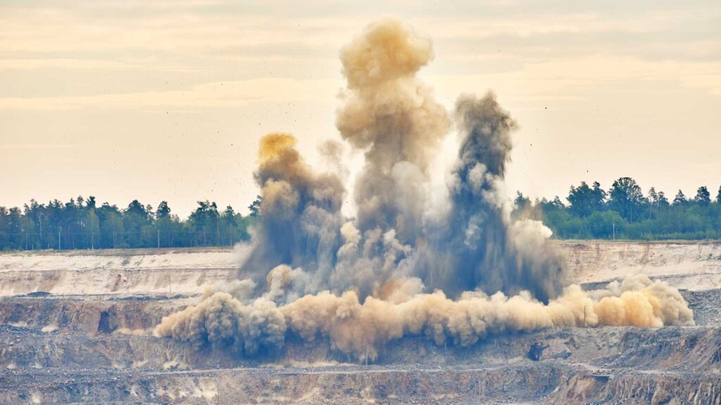 Picture of an explosion at an aggregate mining operation.