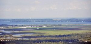 Arial photo of the Holland Marsh, with Lake Simcoe in the distance. Credit Jeff Laidlaw.