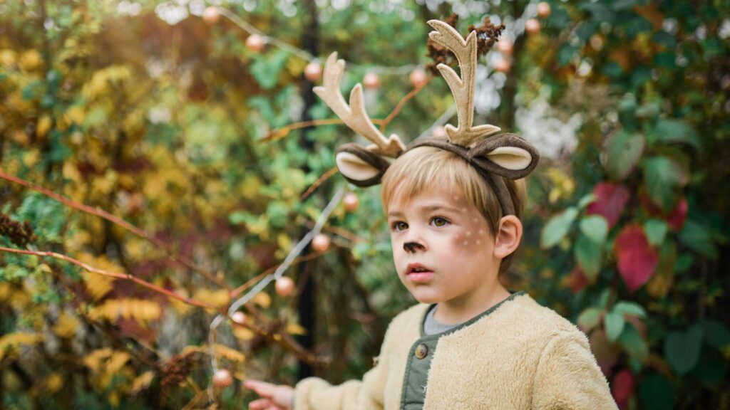 Photo of a child dressed up as a deer for halloween. Credit Paige Cody.