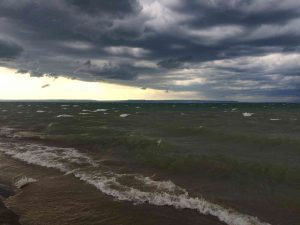 Photo of stormy clouds over Nottawasaga Bay, from Allendwood Beach. Credit Adam Ballah
